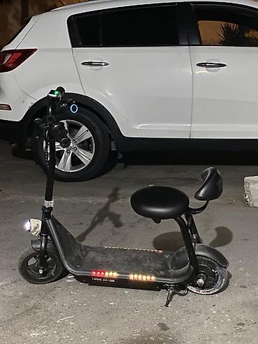 Электротранспорт: Oturacaqlı elektrik skuter -saatda 20 km surerle hereket edir — 3