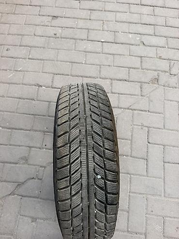 е 210: Комплект из 4 автомобильных шин. - Тип: зимние (симметричный — 3