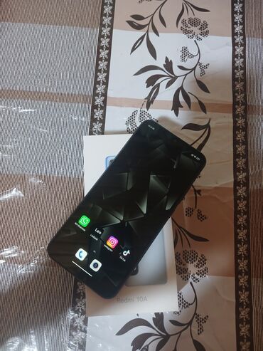 xiomi mi 9t pro: Xiaomi Redmi 10A, 128 ГБ, цвет - Черный, 
 Гарантия, Сенсорный, Отпечаток пальца
