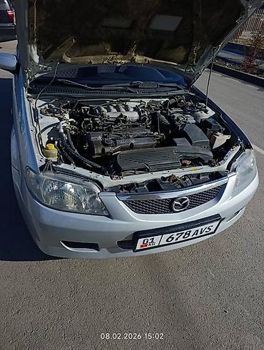 слиндир: Mazda Familia: 2002 г., Механика, Бензин, Хэтчбэк — 2