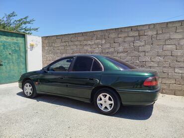 Opel Omega: 2 л | 1994 г. Седан