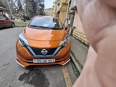 генератор фольксваген: Nissan Note e-POWER, narıncı rəngli, şəhər üçün ideal hibrid (benzin — 1
