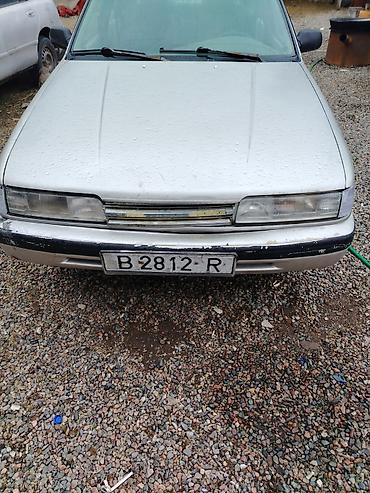 Oldsmobile: Mazda 626: 1988 г., Механика, Бензин, Седан — 4