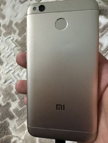 telefon zəngləri: Xiaomi Redmi 4X, 32 GB, rəng - Bej, 
 Barmaq izi, Sensor