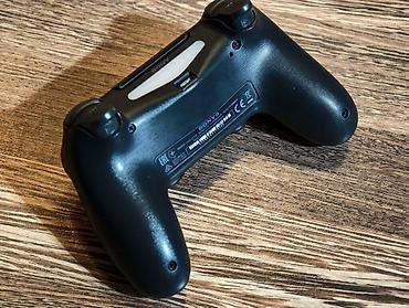 soni: Беспроводной геймпад Sony DualShock 4 (модель CUH-ZCT1E), цвет черный — 3