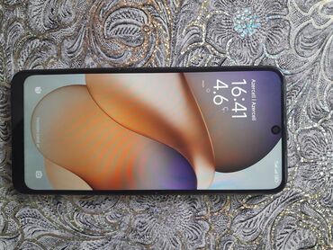 xiaomi mia 2 qiymeti: Xiaomi Redmi 12, 128 ГБ, цвет - Черный, 
 Отпечаток пальца, Две SIM карты, С документами