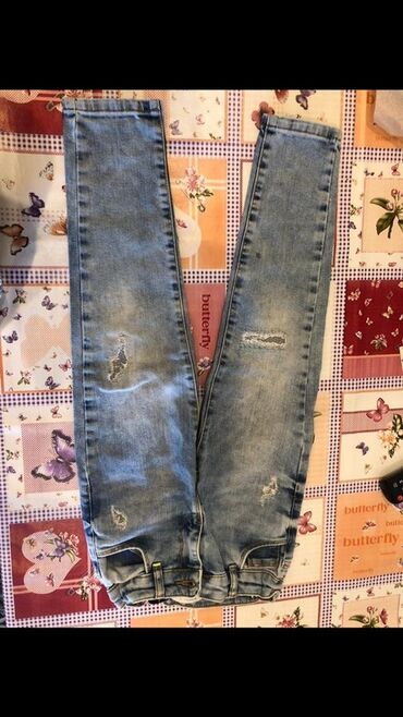 Dəstlər: Uşaq cins şalvarı - Rəng: açıq mavi “washed” effektli - Stil: düz