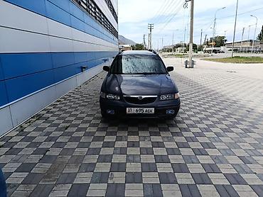 385 55: Mazda Capella: 1999 г., 2 л, Механика, Бензин, Универсал — 3