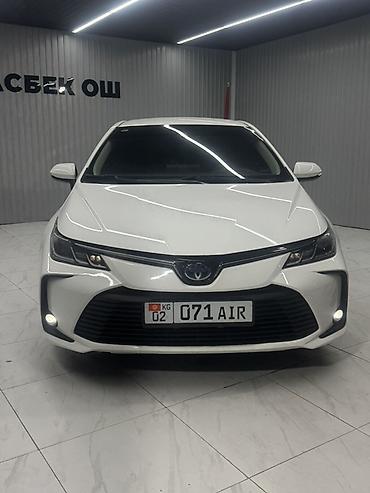 приус 2024: Toyota Corolla: 2022 г., Гибрид, Седан — 1