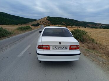 Proton: Ağ rəngli bu avtomobil rahat səyahətlər üçün nəzərdə tutulub