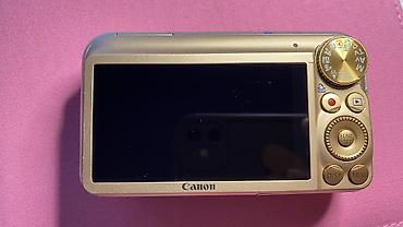 Canon PowerShot SX210 IS fotoaparatı satılır. Qızılı rəngdədir, çox az — 3