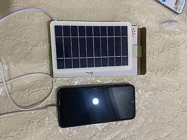 sandvic panel: Günəş enerjisi ilə işləyən portativ enerji paneli və USB çıxışı. - — 3