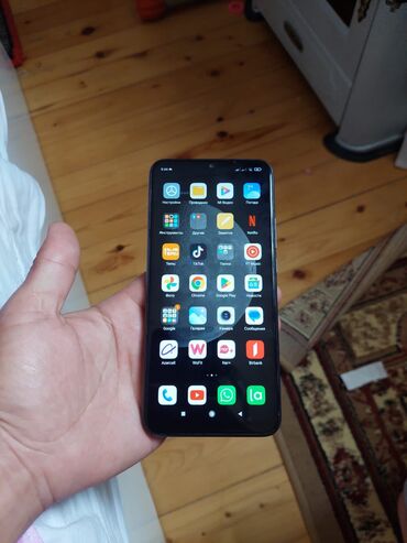 xiaomi mi2: Xiaomi Redmi 9, 32 ГБ, цвет - Черный, 
 Сенсорный, Отпечаток пальца, Две SIM карты