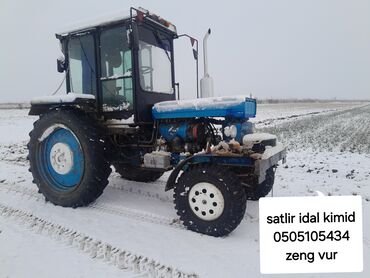mersedes suretler qutusu: Mavi-qara rəngdə, kabinəli traktor. - Ön və arxa iri protektorlu
