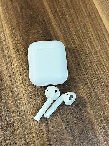 ipad min 5: Apple AirPods (1-ci/2-ci nəsil form-faktorunda) simsiz qulaqlıqlar və — 1