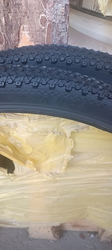 калпак р 15: Покрышка для велосипеда Kenda размером 26x1.95 дюйма. Имеет протектор