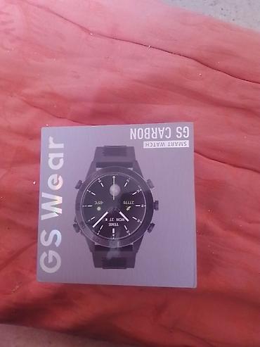 часы coros: Смарт‑часы GS Wear GS Carbon - Классический круглый корпус, три — 2