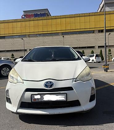 100: Toyota Prius C: 2012 г., 1.5 л, Автомат, Гибрид, Хэтчбэк — 1