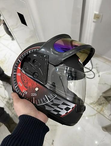 elektron moto: Motosiklet üçün tam üz qapalı dəbilqə. Qara rəngli korpus üzərində — 2
