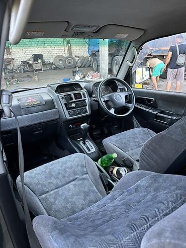 Транспорт: Mitsubishi Pajero iO: 2002 г., Автомат, Бензин, Внедорожник — 1