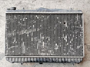 Радиаторы: Радиатор Hyundai Pony / Excel / Scoupe, 1992г.в. Оригинал б/у, из — 10