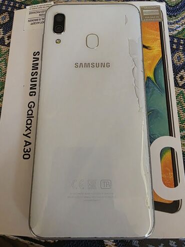 Информатика: Samsung Galaxy A30, 32 ГБ, цвет - Белый, Отпечаток пальца, Face ID