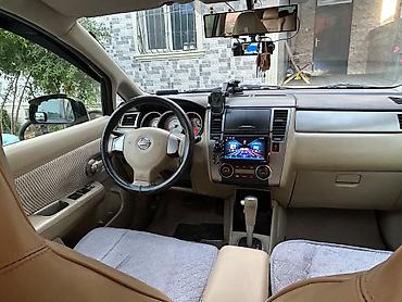 Транспорт: Nissan Tiida: 1.5 л | 2011 г. Хэтчбэк — 8