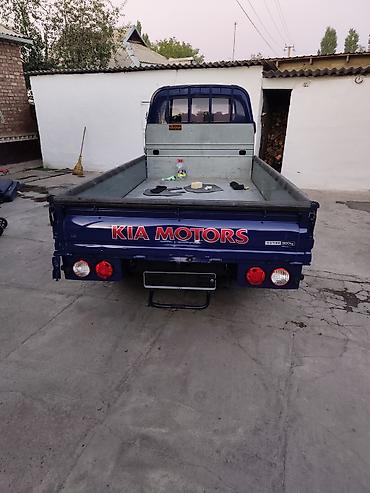 борта: KIA Bongo (K2500/K2700) бортовой малотоннажный грузовик, синий цвет — 6