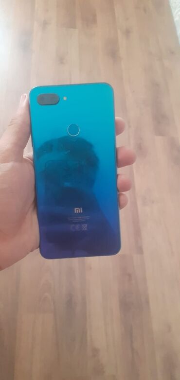 телефон fly 9: Xiaomi Mi 8 Lite, 64 ГБ, цвет - Синий, 
 Отпечаток пальца, Face ID