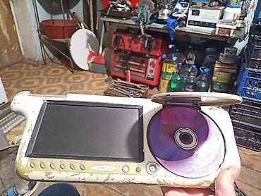 pultlu masin boyuk: Portativ DVD pleyer – daxili ekranlı model Xüsusiyyətlər: - Daxili — 2