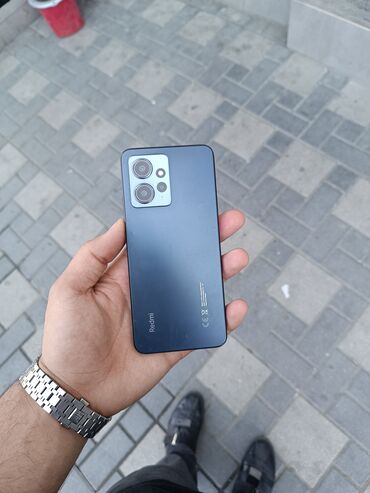 flai 408 telefon: Xiaomi Redmi Note 12, 128 ГБ, цвет - Серый, 
 Кнопочный, Отпечаток пальца, Две SIM карты