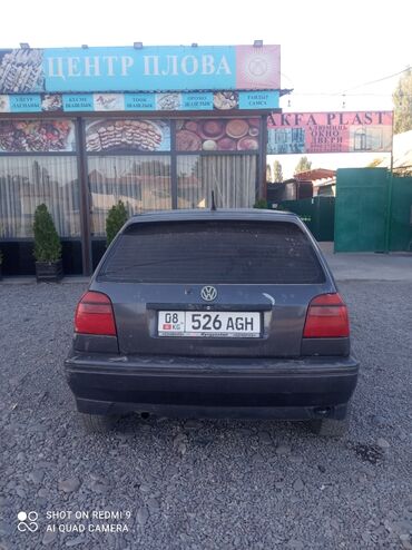 уна тетиктери: Хэтчбек Volkswagen Golf III, выполненный в темно-сером цвете