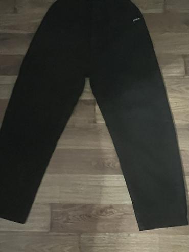 tech fleece: Брюки/джоггеры черного цвета. - Прямой крой, свободная посадка. - — 1