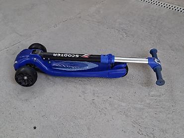 scooter ucuz: Uşaq skuterı – 3 təkərli, mavi rəng Xüsusiyyətlər: - 3 təkərli — 5