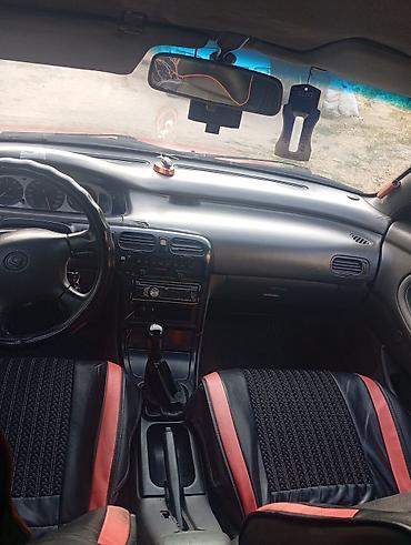 продам кару: Mazda Cronos: 1992 г., 2 л, Механика, Бензин, Хэтчбэк — 6