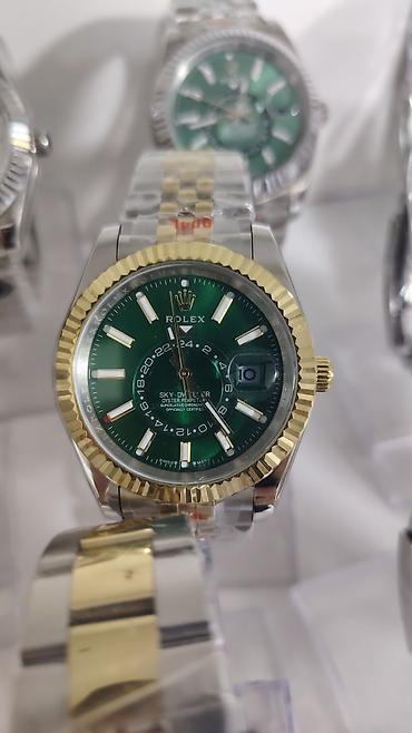 saat omega: Rolex Sky-Dweller qol saatları - Model: Sky-Dweller (Oyster — 5