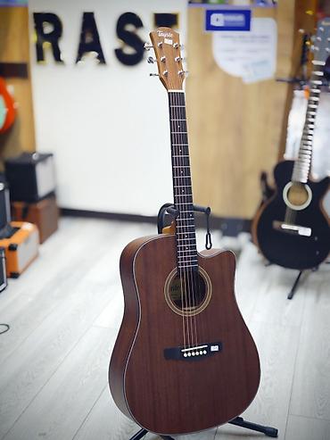 Akustik gitara Rast musiqi aletleri maģazasinin ünvanları ; 1___