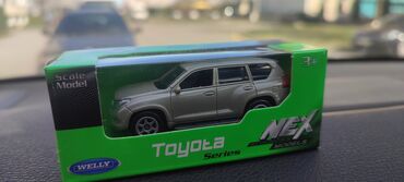 игрушки 1: Продаю модельку Toyota prado 1:64. welly