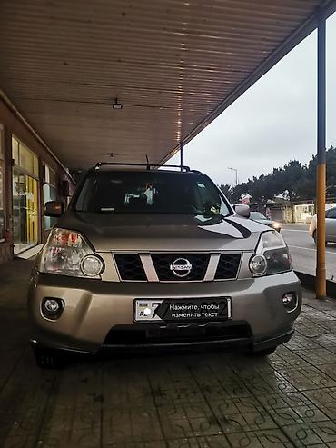 jetta 2008: Nissan X-Trail model avtomobili. Açıq qəhvəyi rəngdə, dam relsləri ilə — 1