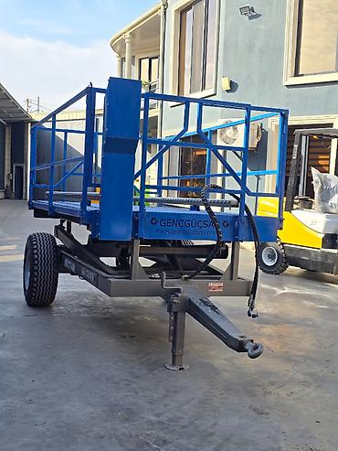 traktor starter: Gücsan markalı kənd təsərrüfatı/bağçılıq üçün yığıma platforması — 2