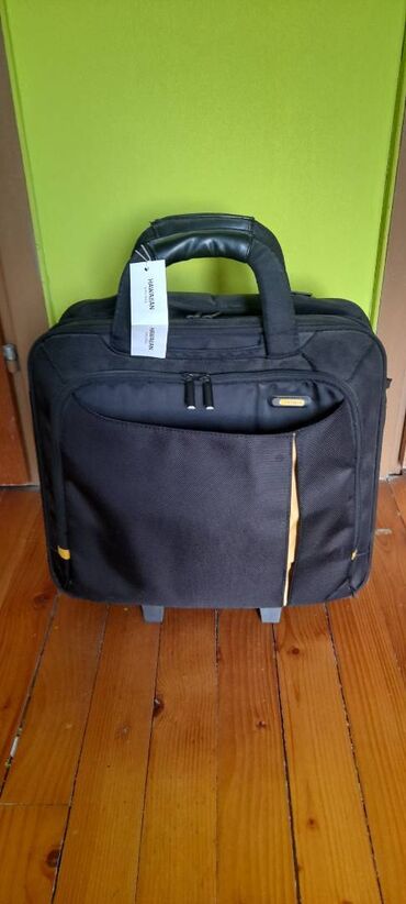 Putni koferi i torbe: Odlicna Targus torba za putovanje avionom, ima dosta pregrada, pa moze — 1