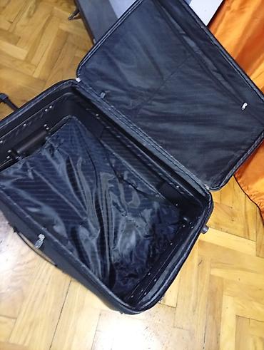 Putni koferi i torbe: Veliki kofer na točkiće sa teleskopskom ručkom. oko 75 50 30 — 9
