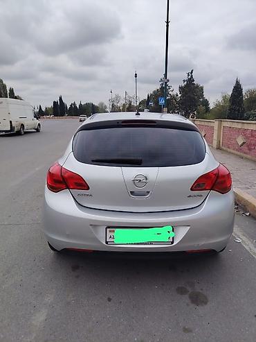 qazel yuk masin: Opel Astra hatchback – gümüşü rəng Kuzov: 5 qapılı hatchback Mühərrik — 2