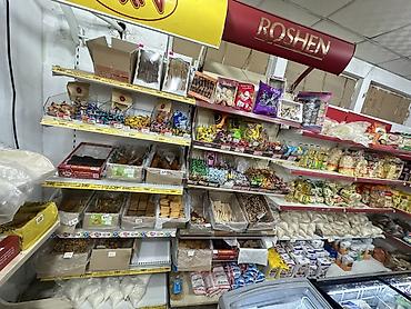 китайский орех: Продуктовый магазин с широким ассортиментом повседневных товаров. - — 4