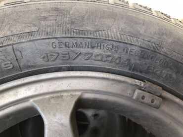 2) Комплект колес на литых дисках: - Пара дисков с шинами 175/70 R14