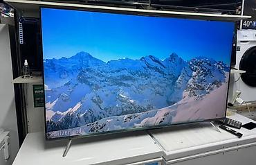 Телевизоры: Телевизор SKYWORTH 65" - Платформа: Google TV — единый экран — 14