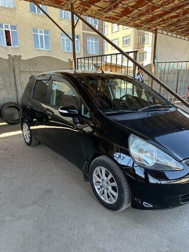 голыф 4: Honda Jazz: 2006 г., 1.4 л, Вариатор, Бензин, Седан