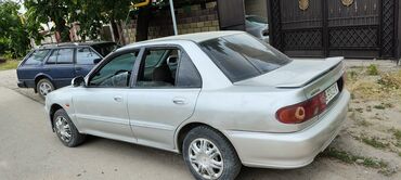 Mitsubishi: Mitsubishi Lancer: 1994 г., 1.6 л, Механика, Бензин, Седан