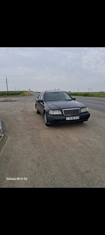 Saturn: Mercedes-Benz C-Sinif (W202) sedan - Kuzov: 4 qapılı sedan, tünd mavi