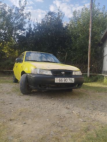 бампер опель вектра б: Daewoo Nexia sedan Xüsusiyyətlər: - Kuzov: 4 qapılı sedan, sarı rəng — 6